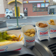 My food items lined up in my car. I added relish to my chili-cheese Coney (very, very green relish).